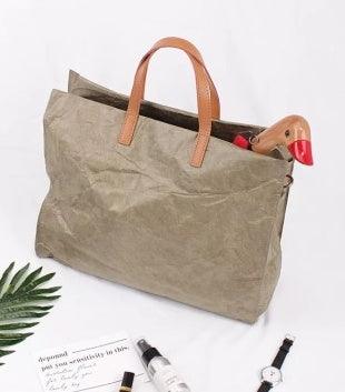 Stilvolle Eco-Papierhandtasche aus Dupont-Papier und Canvas, robust und umweltfreundlich, ideal für den Alltag.