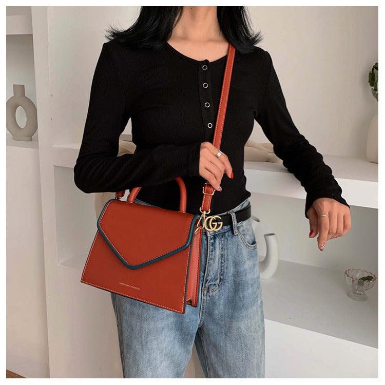 Kompakte Crossbody-Schultertasche in Khaki, Blau, Schwarz oder Orange – praktisch für den Alltag.