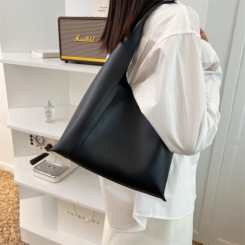 Eleganter Damen-Shopper in stilvollem Design mit grosser Kapazität, ideal für Alltag und Freizeit.