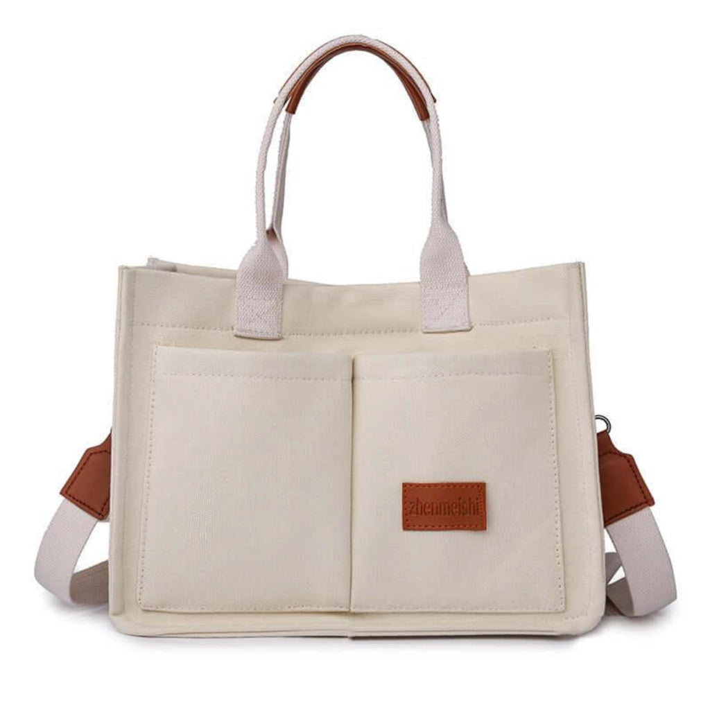 Stofftasche in Beige mit zwei Fronttaschen und abnehmbarem Gurt