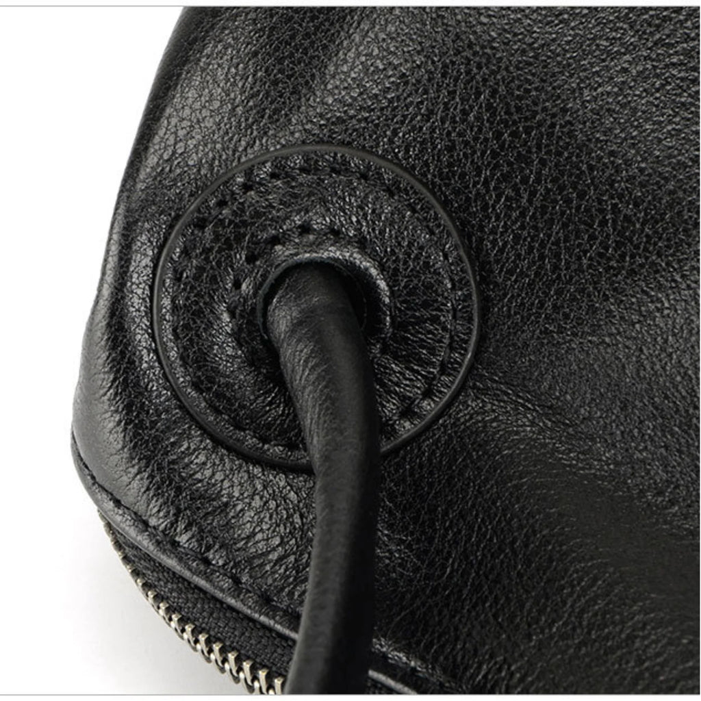 Verstärkte Griffverbindung an der Tasche – rund eingefasst in Echtlederoptik