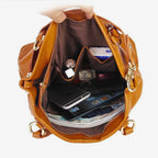 Innenansicht der Tasche mit Zipperfach, Handyfach, Notizbuch und Kosmetik – organisiert und alltagstauglich