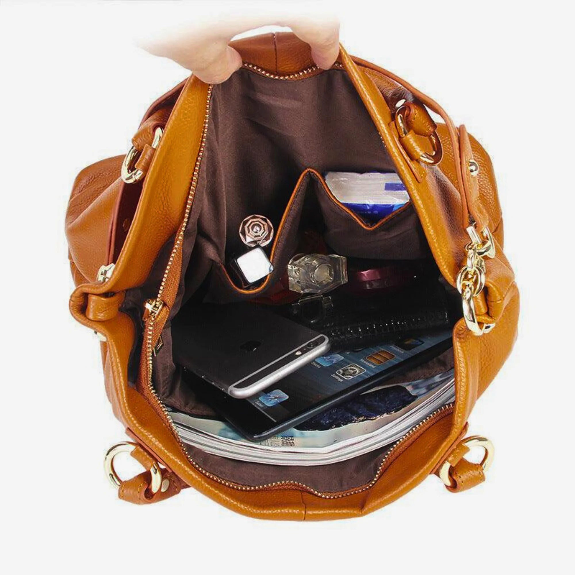 Innenansicht der Tasche mit Zipperfach, Handyfach, Notizbuch und Kosmetik – organisiert und alltagstauglich
