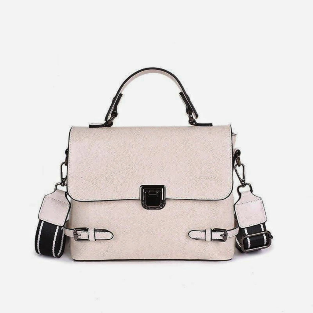 Helle Lederhandtasche mit schwarzem Gürtelabschluss und Kontrastkante, goldene Details