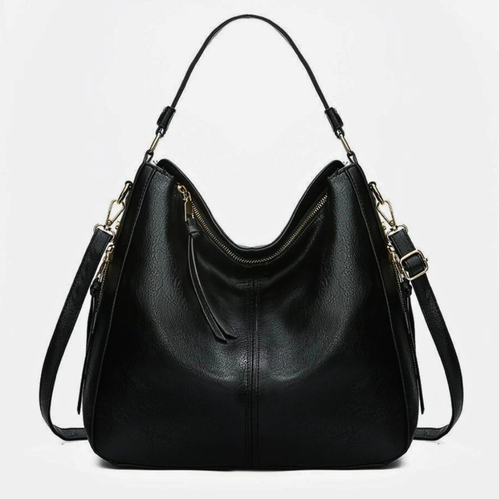 Schwarze Rindsleder-Schultertasche mit geräumigem Innenraum und Crossbody-Gurt