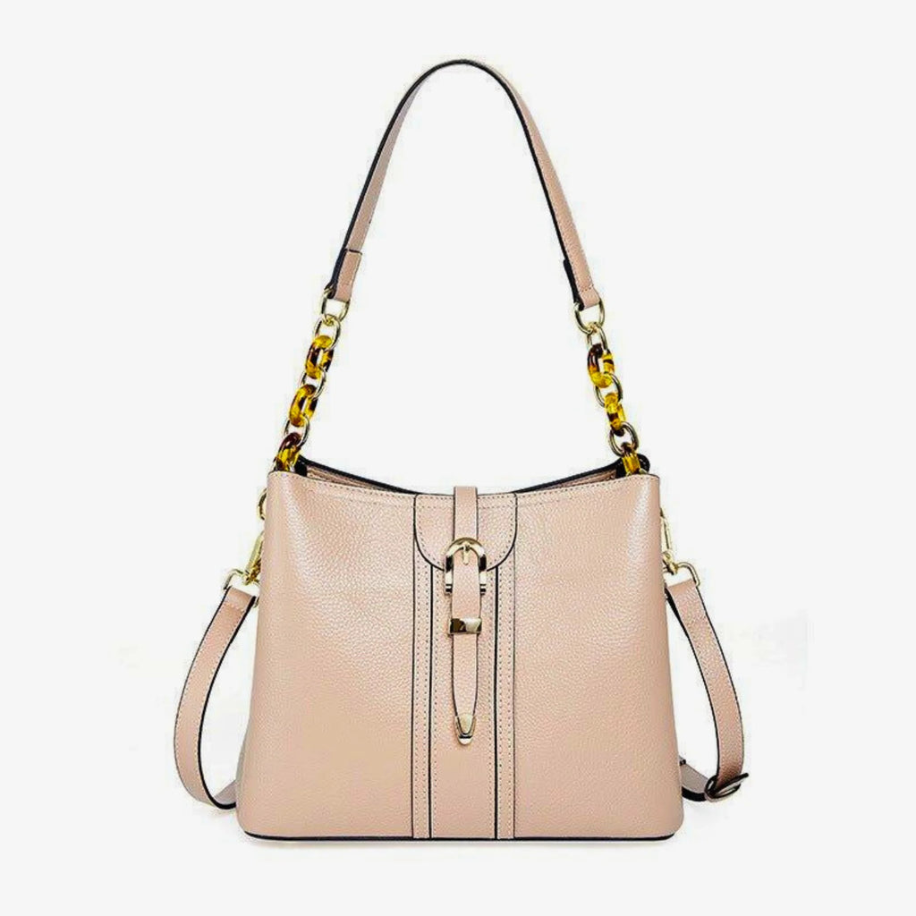 Roséfarbene Echtleder-Bucketbag mit goldener Schließe und hochwertiger Kettendetail