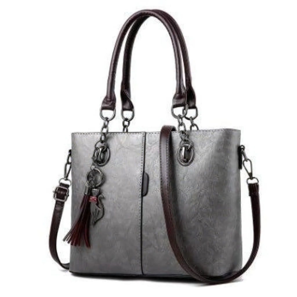 Altrosa Damenhandtasche mit dezenter Prägung, braunem Schulterriemen und logofreiem Design