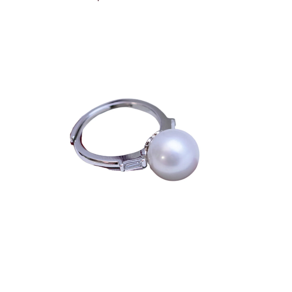 Verstellbarer Ring aus Silber mit runder weisser Perle und seitlich eingefasstem Zirkon
