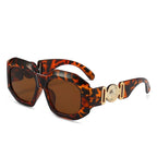 Sonnenbrille in Havanna-Optik mit braunen Gläsern und goldener Seitenstruktur – eckig geführt