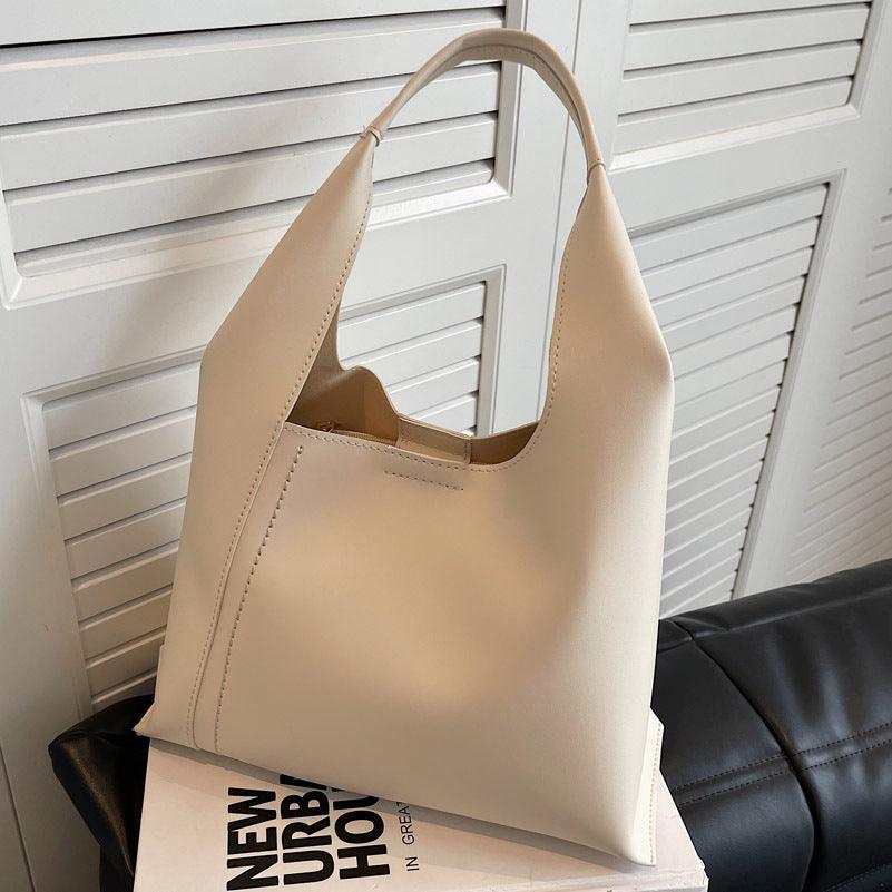 Eleganter Damen-Shopper in stilvollem Design mit grosser Kapazität, ideal für Alltag und Freizeit.