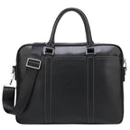 14-Zoll Business-Tasche aus schwarzem Leder – Frontansicht mit abnehmbarem Gurt und ergonomischen Griffen.