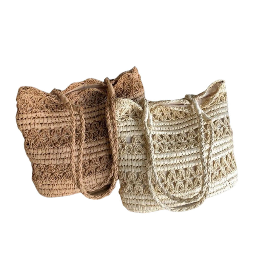 Zwei handgefertigte Boho-Taschen aus Papiergarn in Ivory und Khaki nebeneinander – strukturierter, natürlicher Look