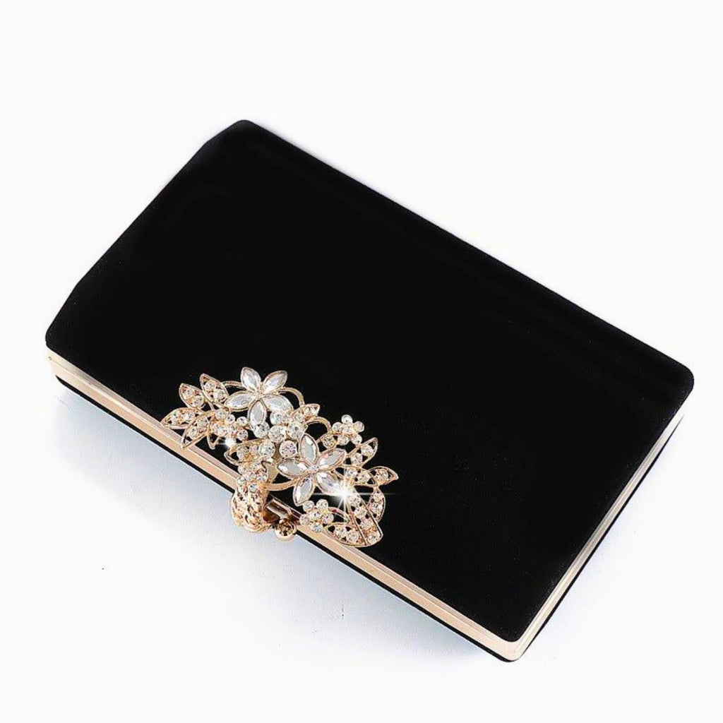 Schwarze Clutch mit floraler Strass-Applikation und Klickverschluss – edel auf Samt mit goldenem Rahmen