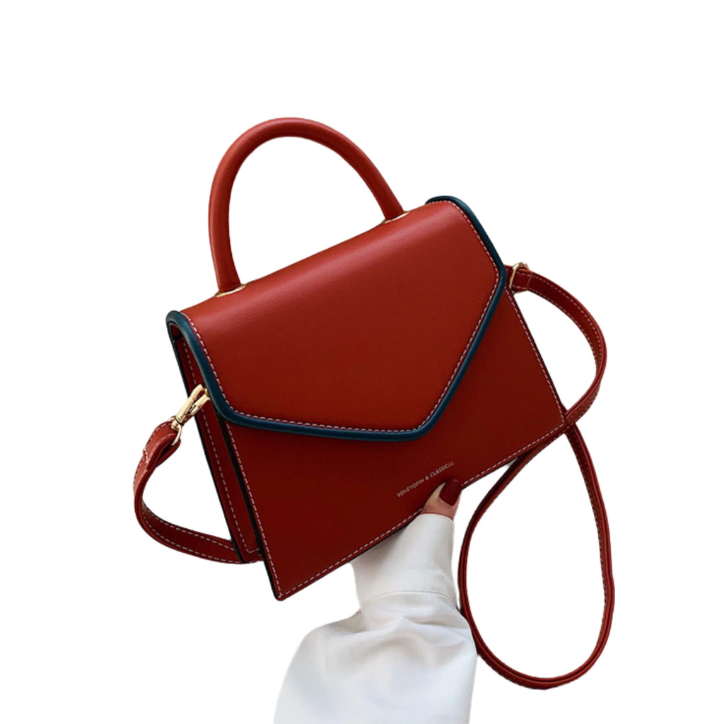 Kleine Umhängetasche in Orange mit Klappdeckel, feiner Naht und strukturierter Oberfläche