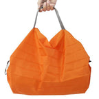 Leichte grosse Falttasche in Tangerine Bold – kräftiges Orange mit grauem Griff