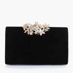 Kompakte Clutch in Schwarz – florale Gold-Strassschliesse auf Samt, ideal für Dinner und Gala