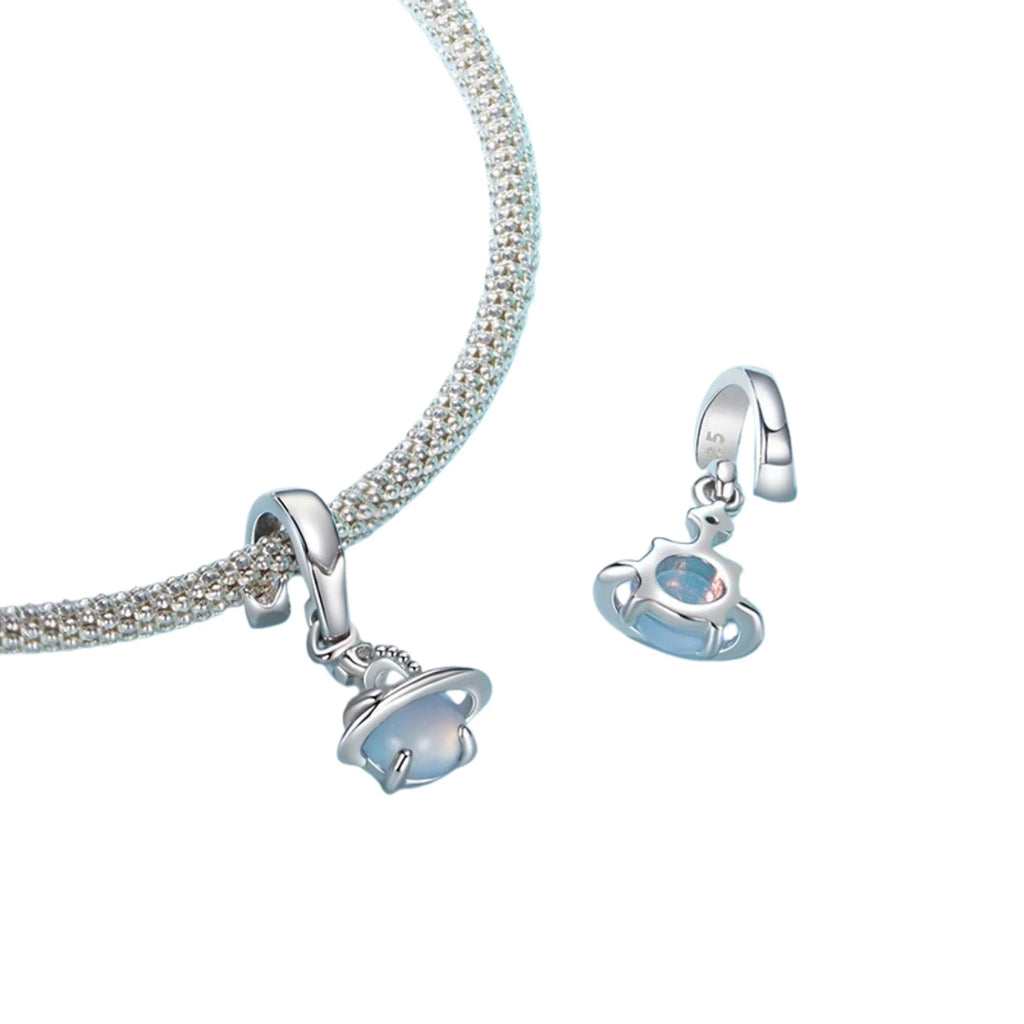 Grössenvergleich des Planetenanhängers mit Münze