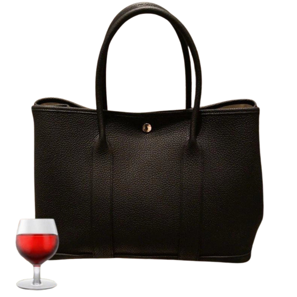 Schwarze PU-Tasche mit Griffdesign – kompakt, pflegeleicht und urban kombiniert