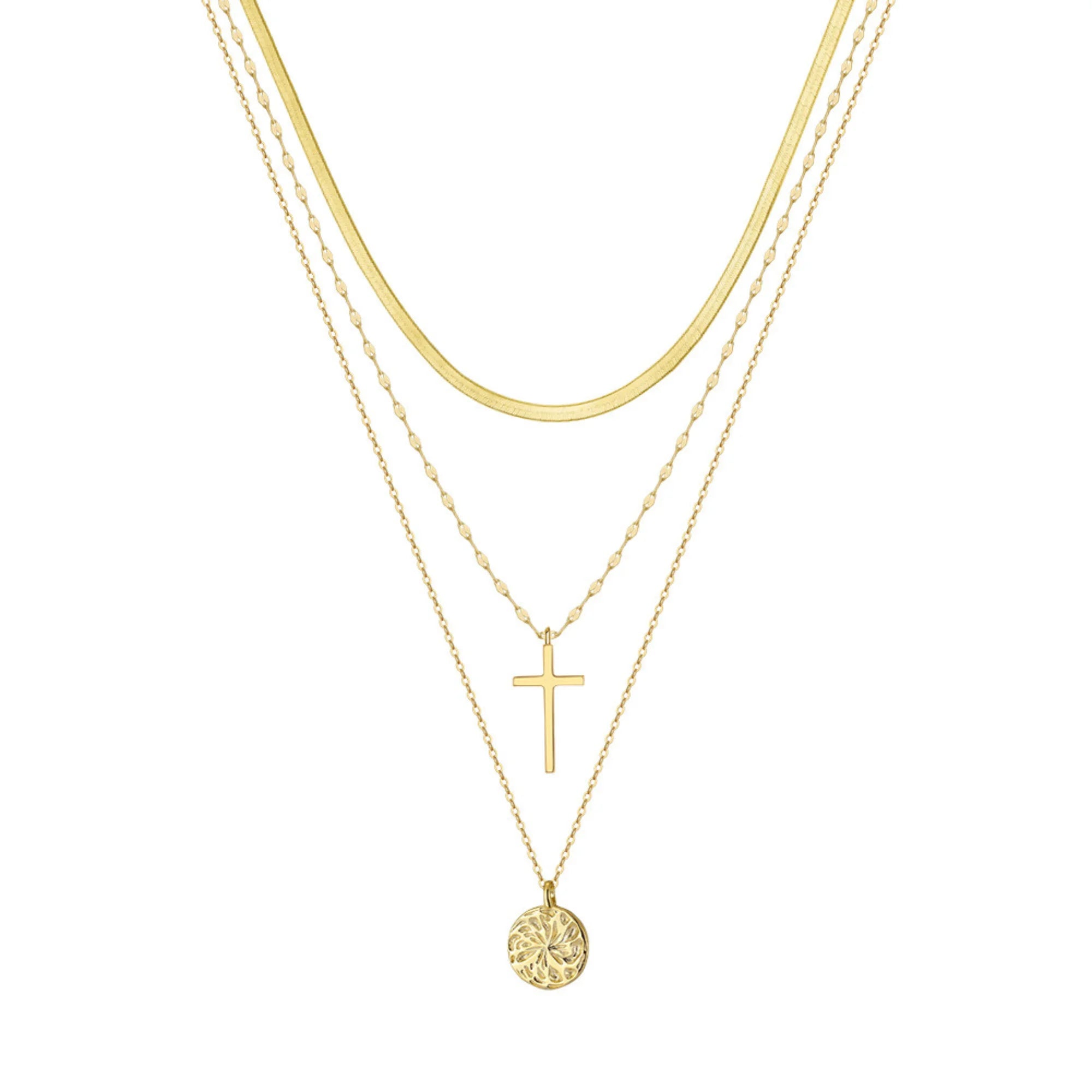 Flatlay der Kreuzkette – Silber- und Goldvariante nebeneinander, reduziert und modern arrangiert