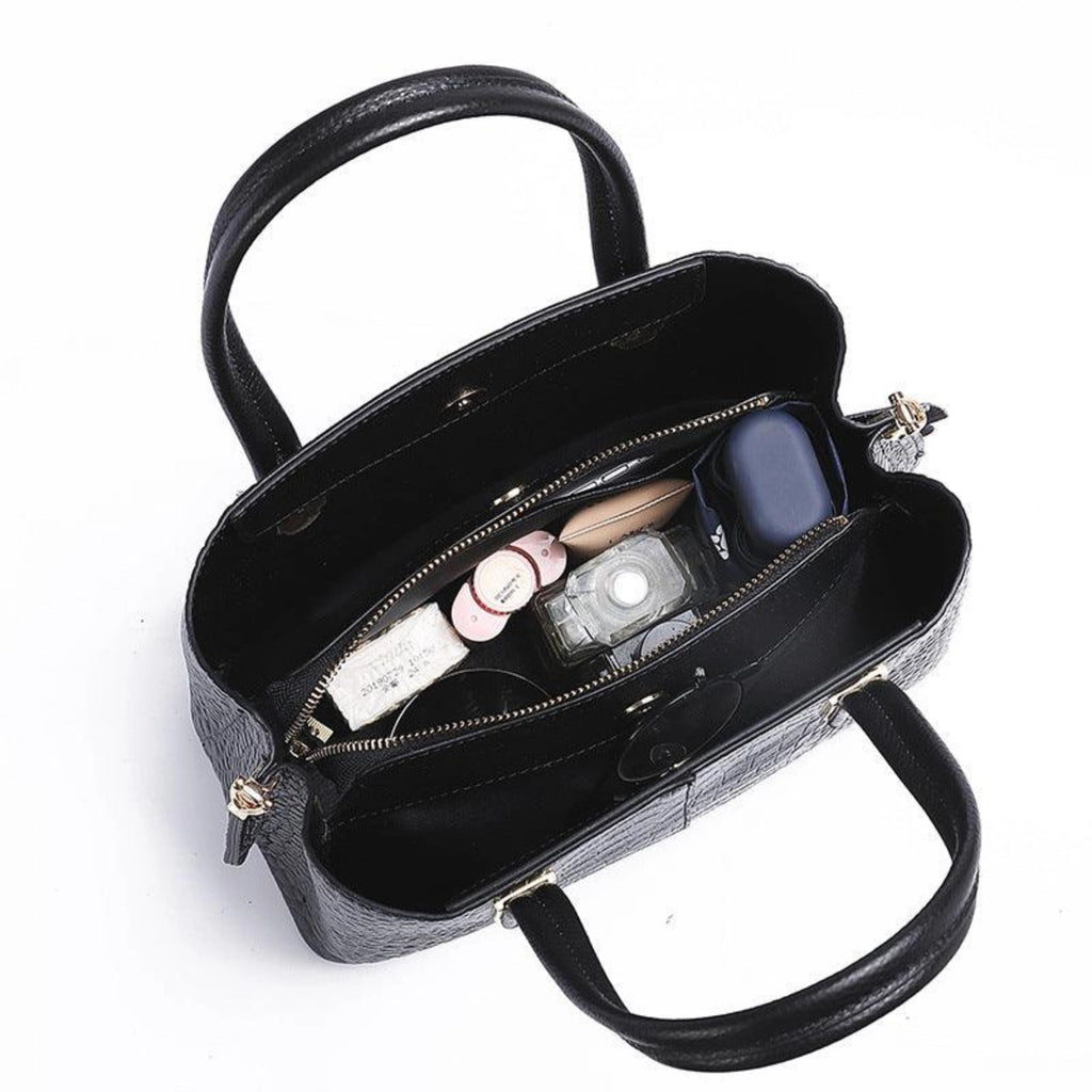 Innenstruktur der Echtledertasche – Reissverschlussfach, Einsteckfächer und genug Platz für Essentials