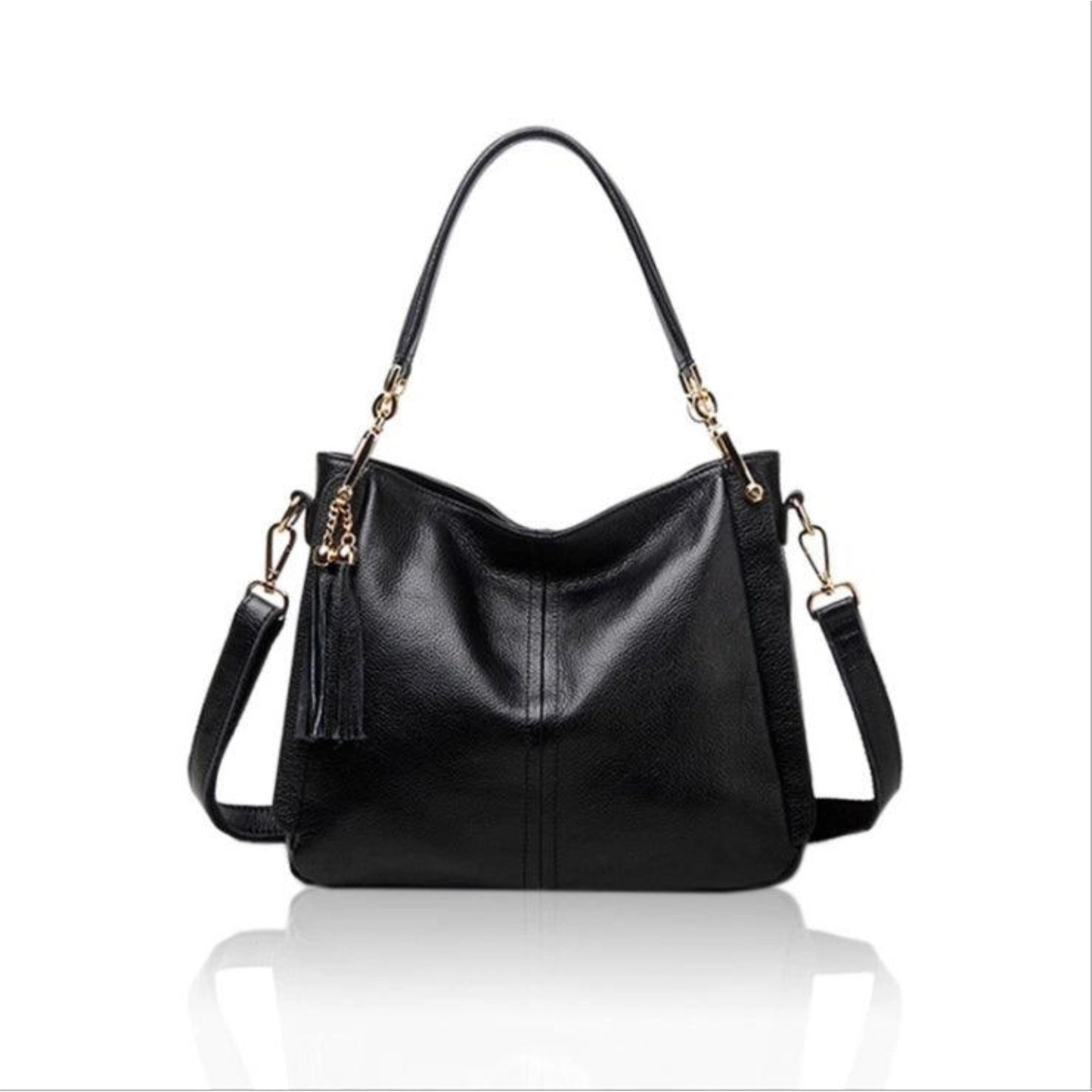 Echtleder Schultertasche in Schwarz – klare Form, goldene Details, Quaste und verstellbarer Riemen