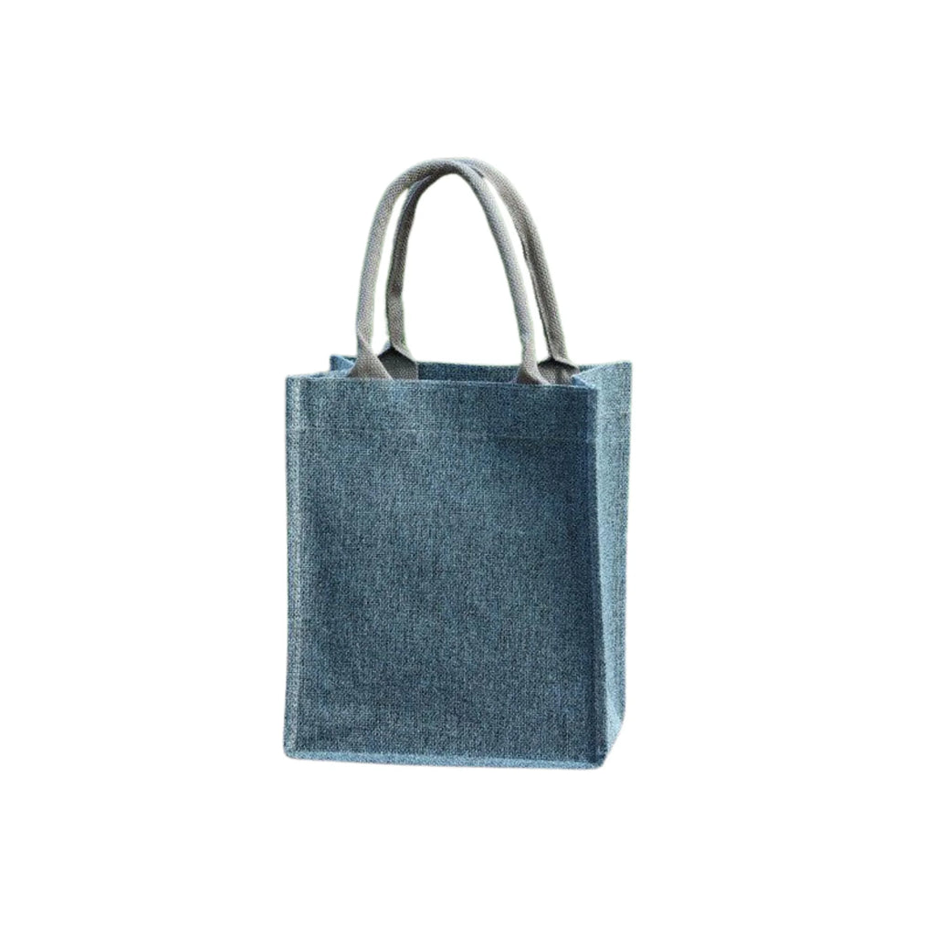 Kompakte Leinentasche in Denim Soft – hochkant, weich strukturiert und tragbar im Alltag