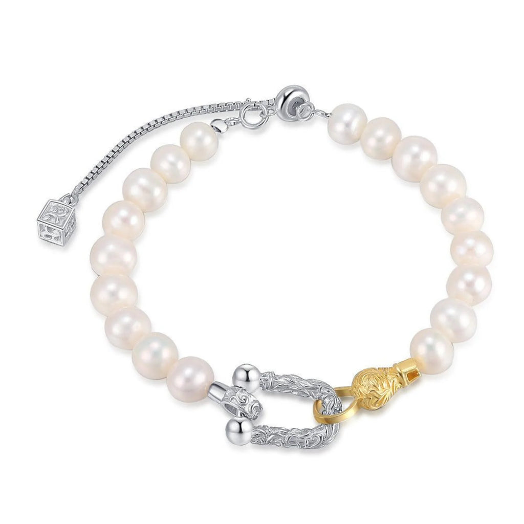 Armband aus echten Süsswasserperlen mit Bicolor-Schliesse in Silber und Gold – technische Klarheit