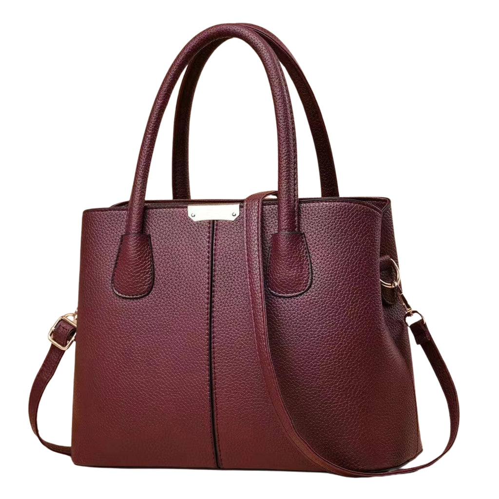 Bordeauxfarbene Umhängetasche aus PU – klarer Schnitt, strukturierte Oberfläche und Reissverschluss