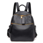 Urban Black Rucksack aus strukturiertem Echtleder – kompaktes Design mit goldfarbenen Reissverschlüssen.