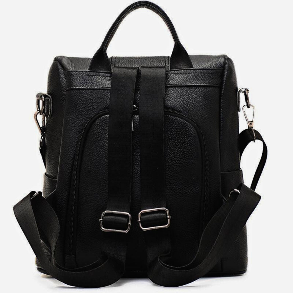 Rückseite des Rucksacks mit ergonomischen Trägern, verstecktem Zipper und integriertem USB-Port.