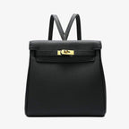 Schwarzer Leder-Rucksack für Damen – strukturiert, markenfrei und mit goldfarbenem Drehverschluss.