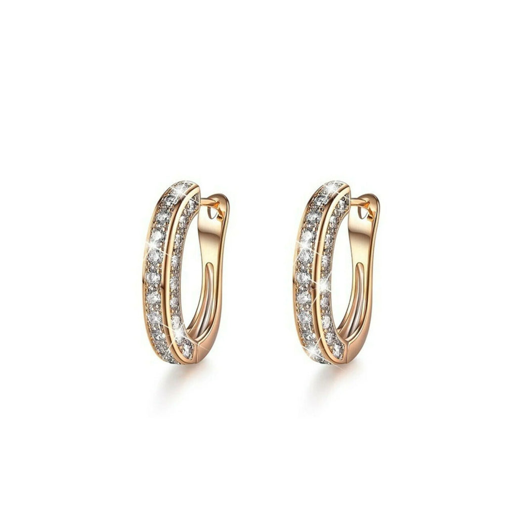 Segment-Creolen in Gold mit ruhig gefasster Zirkonia-Fläche – frontale Ansicht