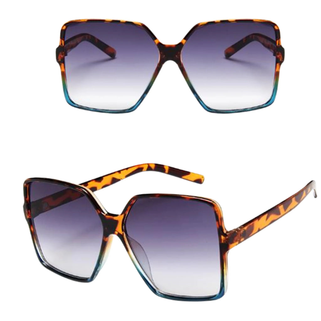 Sonnenbrille mit Havanna-Blau-Musterung und grossflächigen Verlaufsgläsern – doppelte Perspektive