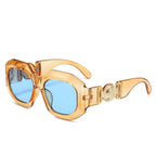 Transparente Sonnenbrille in Orange mit blauen Gläsern – fronta