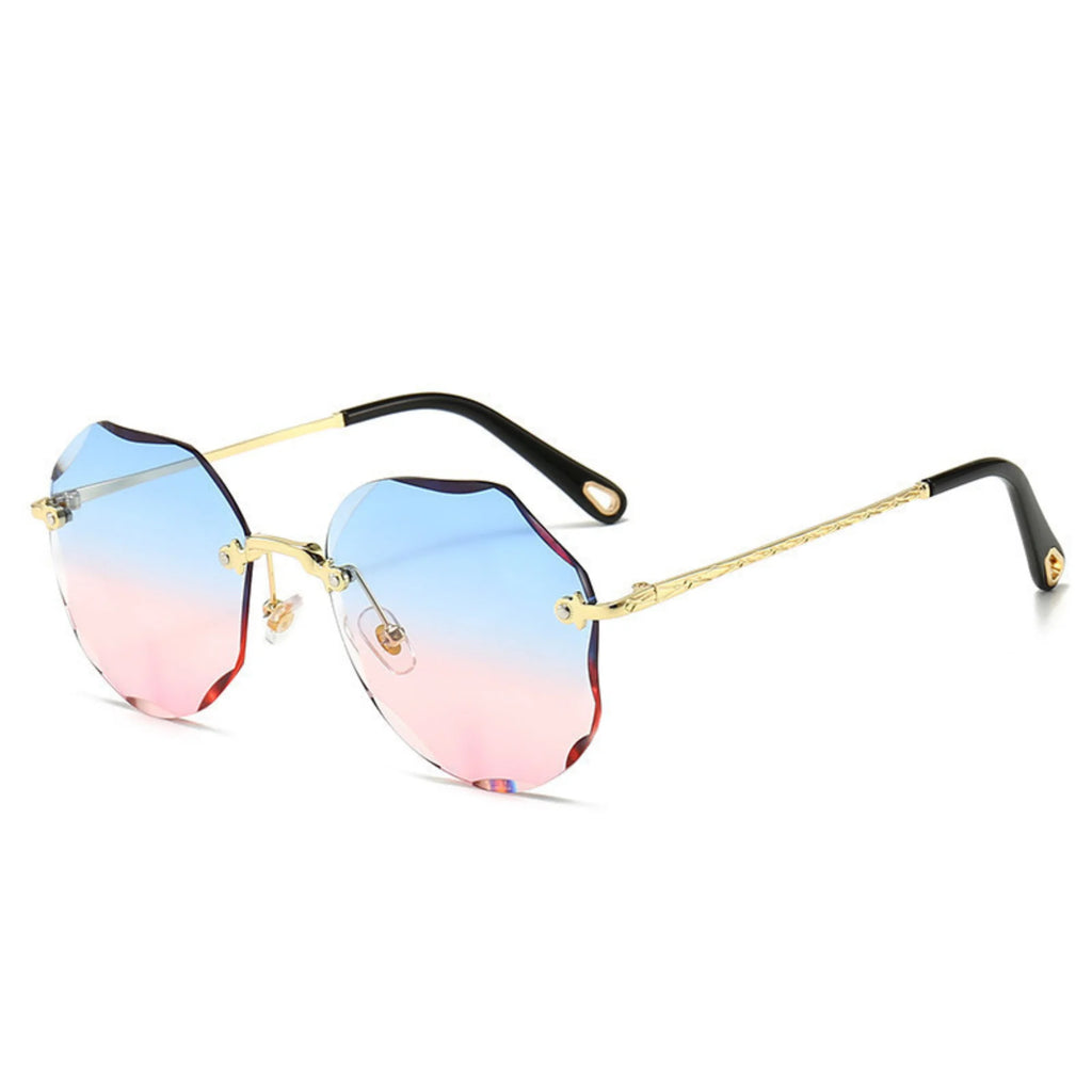 Randlose Sonnenbrille mit blau-rosa Verlauf und goldener Fassung – geometrisch facettiert