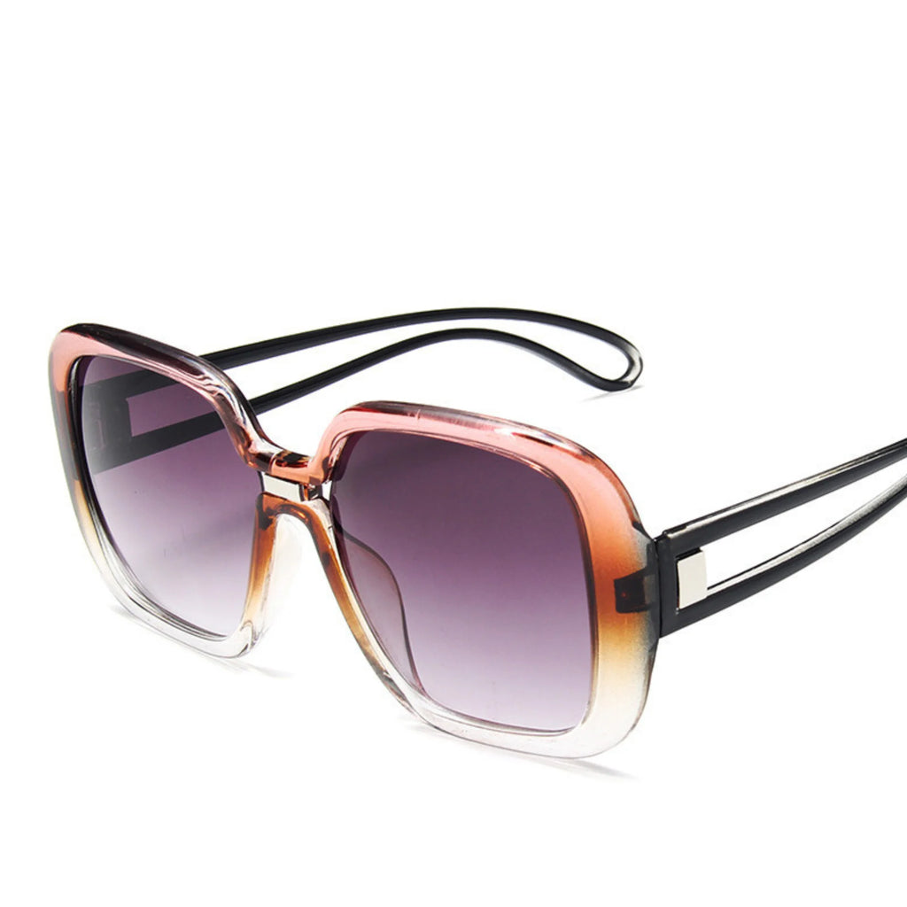 Sonnenbrille mit Apricot-Braun-Verlauf in transparenter Oversize-Optik