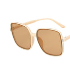 Beigefarbene Sonnenbrille mit durchgehenden braunen Gläsern