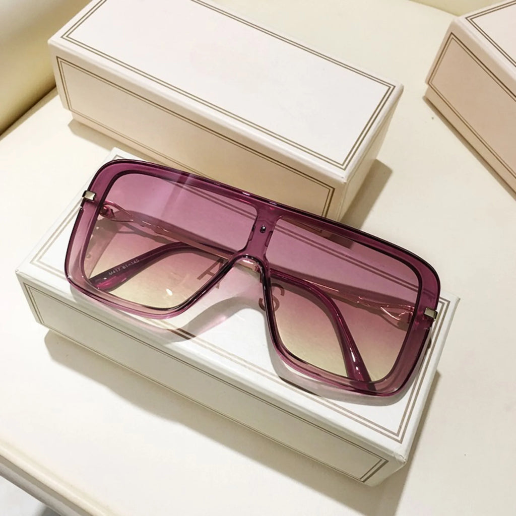 Rosa-visierartige Brille mit weichem Farbverlauf – rechteckig, klar geführt