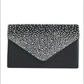 Clutch in Noir Spark mit feinem Strassverlauf – elegante Front im Umschlagdesign