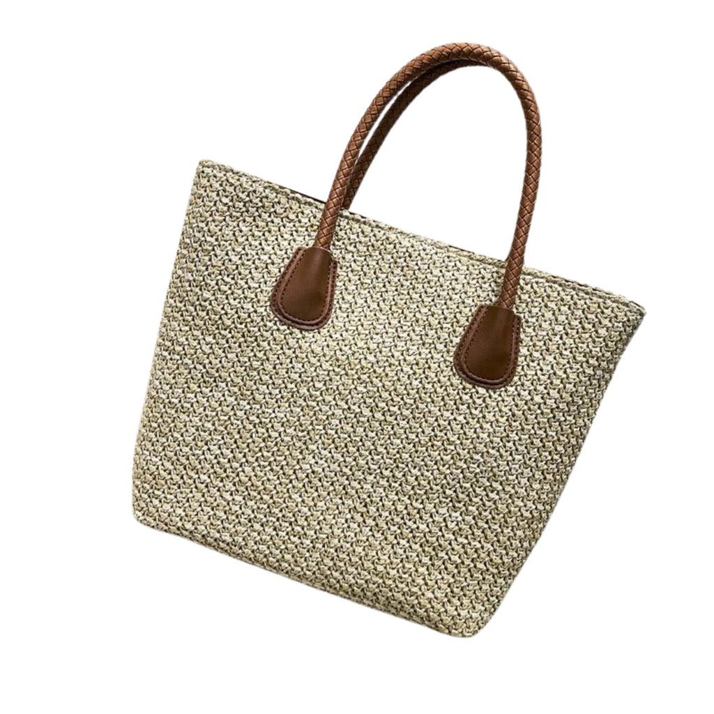 Hellgelbe Naturstrohtasche mit strukturierter Oberfläche und geflochtenem Doppelgriff