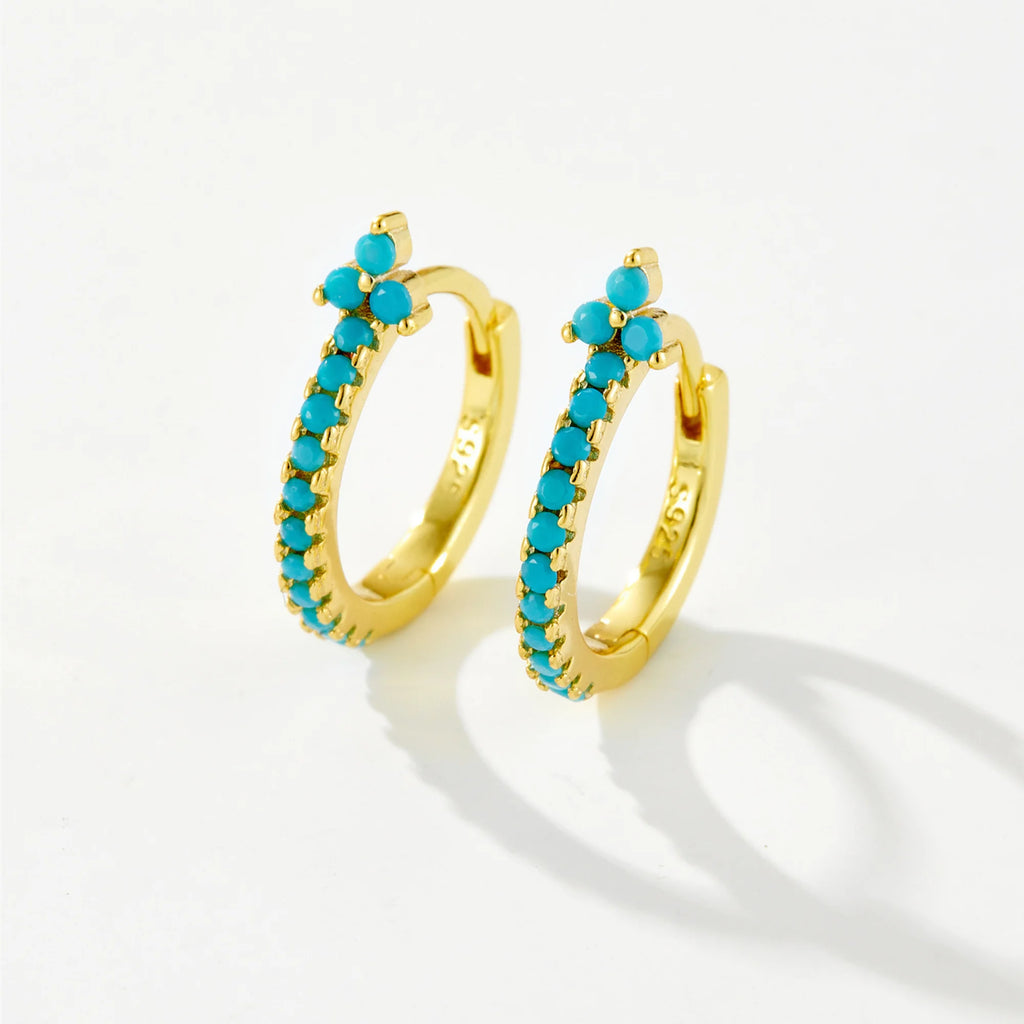 Türkisfarbene Zirkon-Creolen aus 925 Silber mit goldener Fassung – formneutral